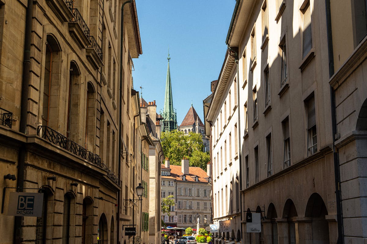 Historic Old Town Geneva featuring classic architecture and St Pierre Cathedral spire