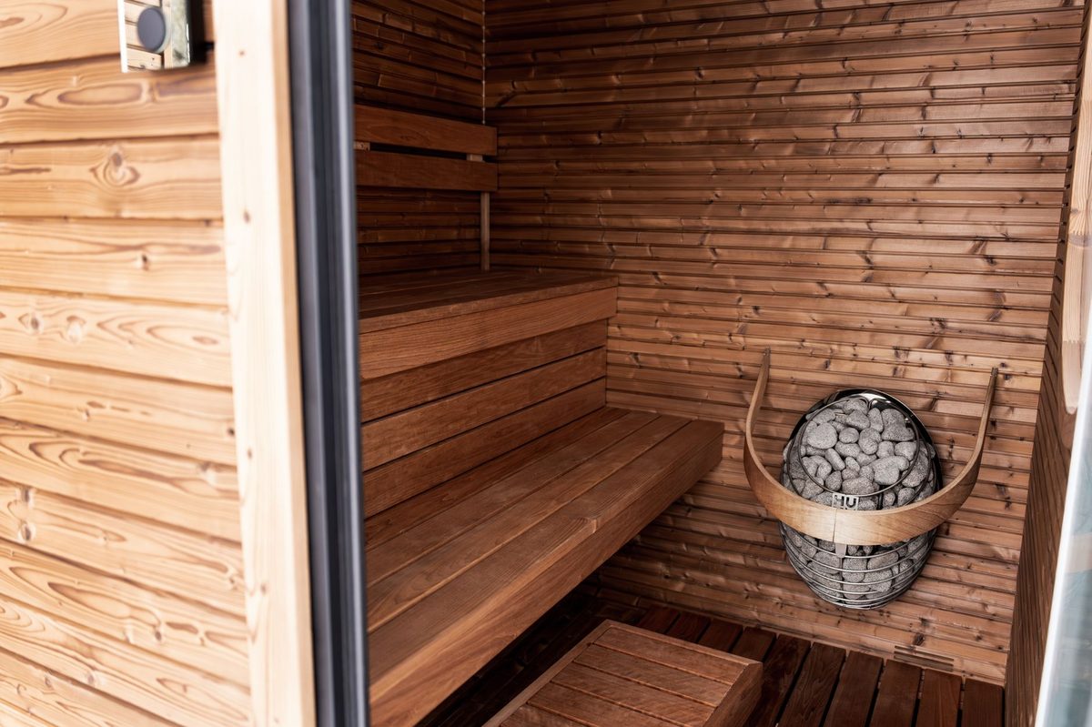 Wooden Nordic sauna interior at the Bains des Paquis in winter