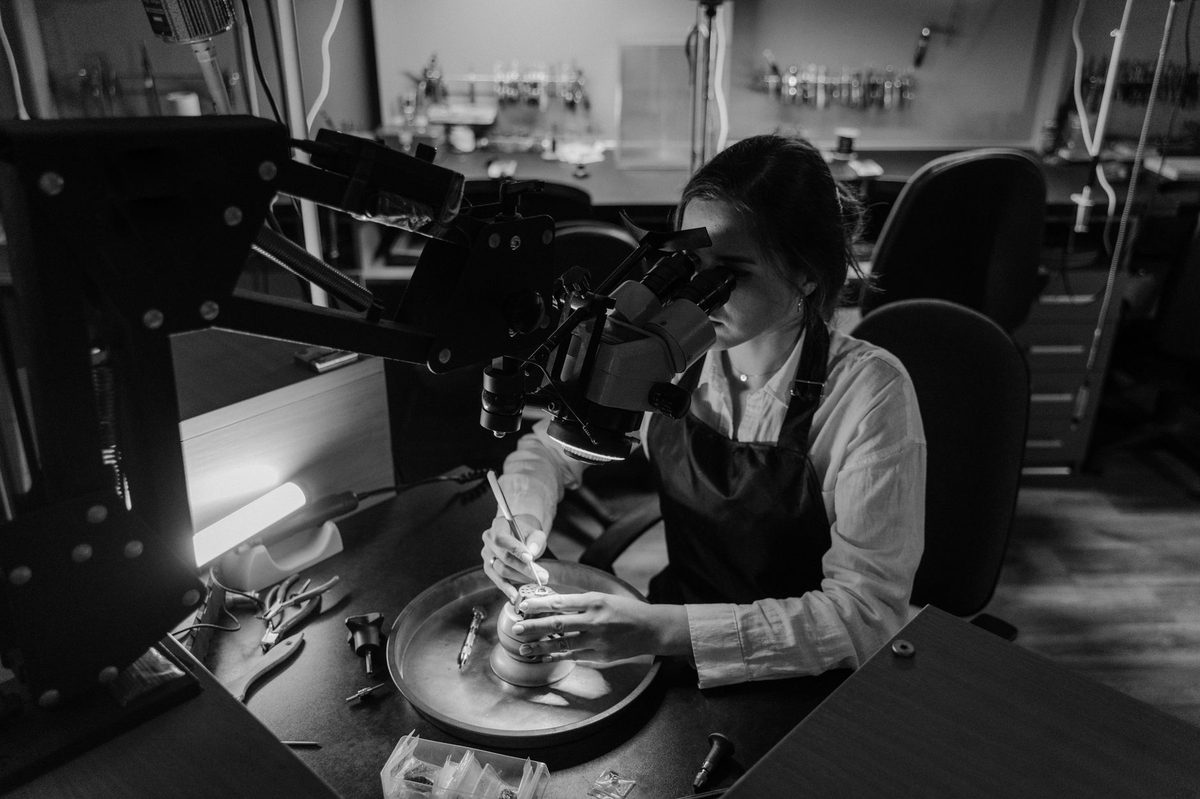 An artisan at work in a small studio, the kind of craft workshop Carouge is known for
