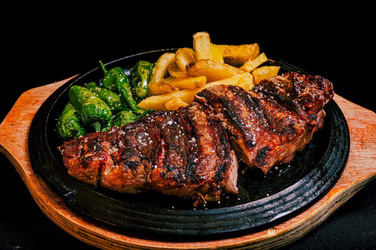 Wood-grilled steak at a Carouge meat bistro in Geneva
