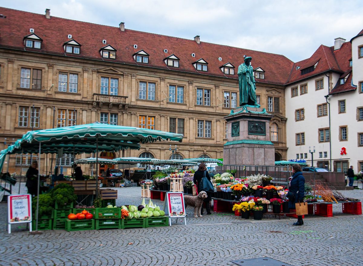 Produce stalls at an outdoor market square, like the centuries-old Place du Marche market in Carouge