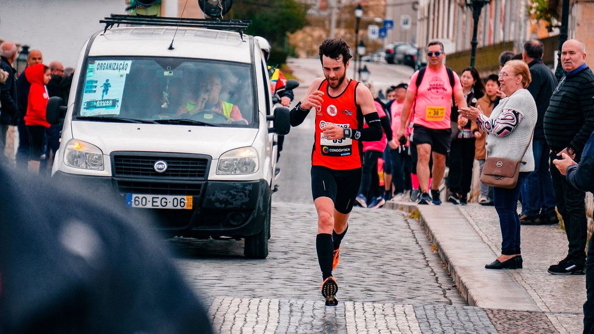 Runners in a winter city race, like the Course de l'Escalade that draws 40,000 people in Geneva