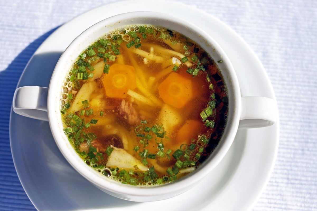 A pot of vegetable soup with leeks and carrots, the soupe de la Mere Royaume served during Geneva's Escalade