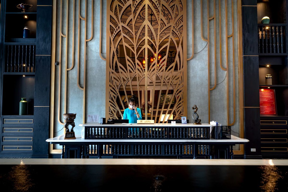 A modern hotel reception, where Geneva airport hotels issue the free Transport Card at check-in