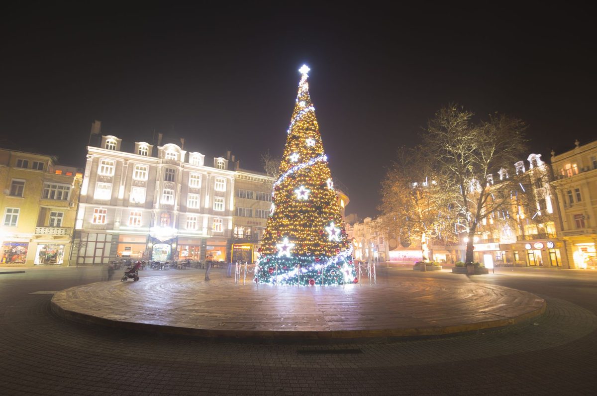 Christmas illuminations strung across a Geneva shopping street in December