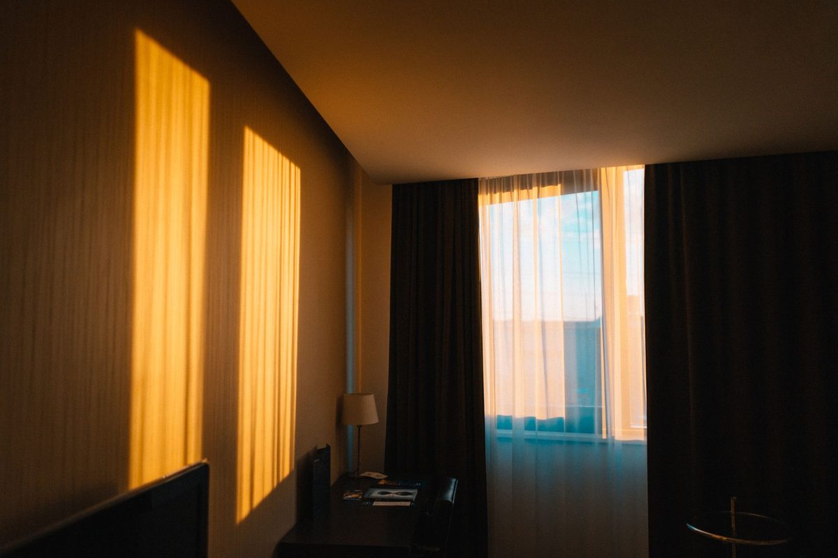 A modern minimalist design hotel room, typical of Geneva contemporary boutique stays