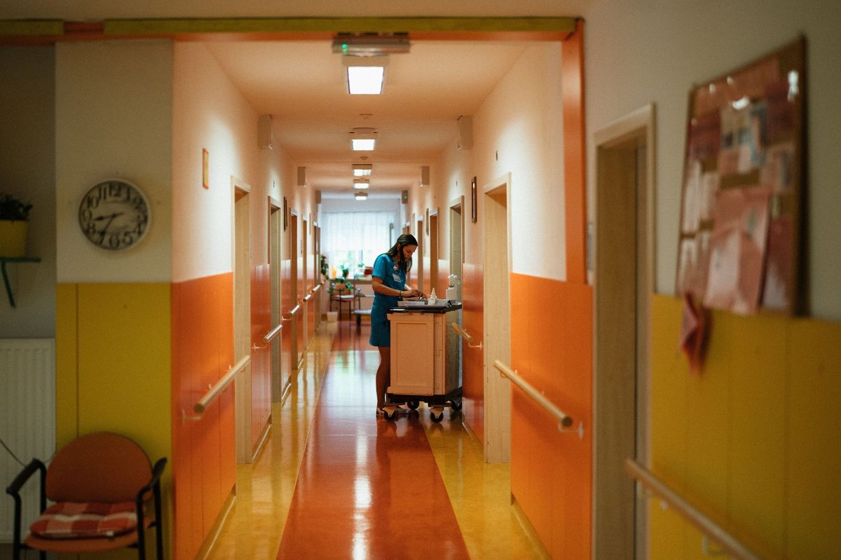 A modern hospital corridor, a reminder Geneva healthcare is excellent but costly without insurance