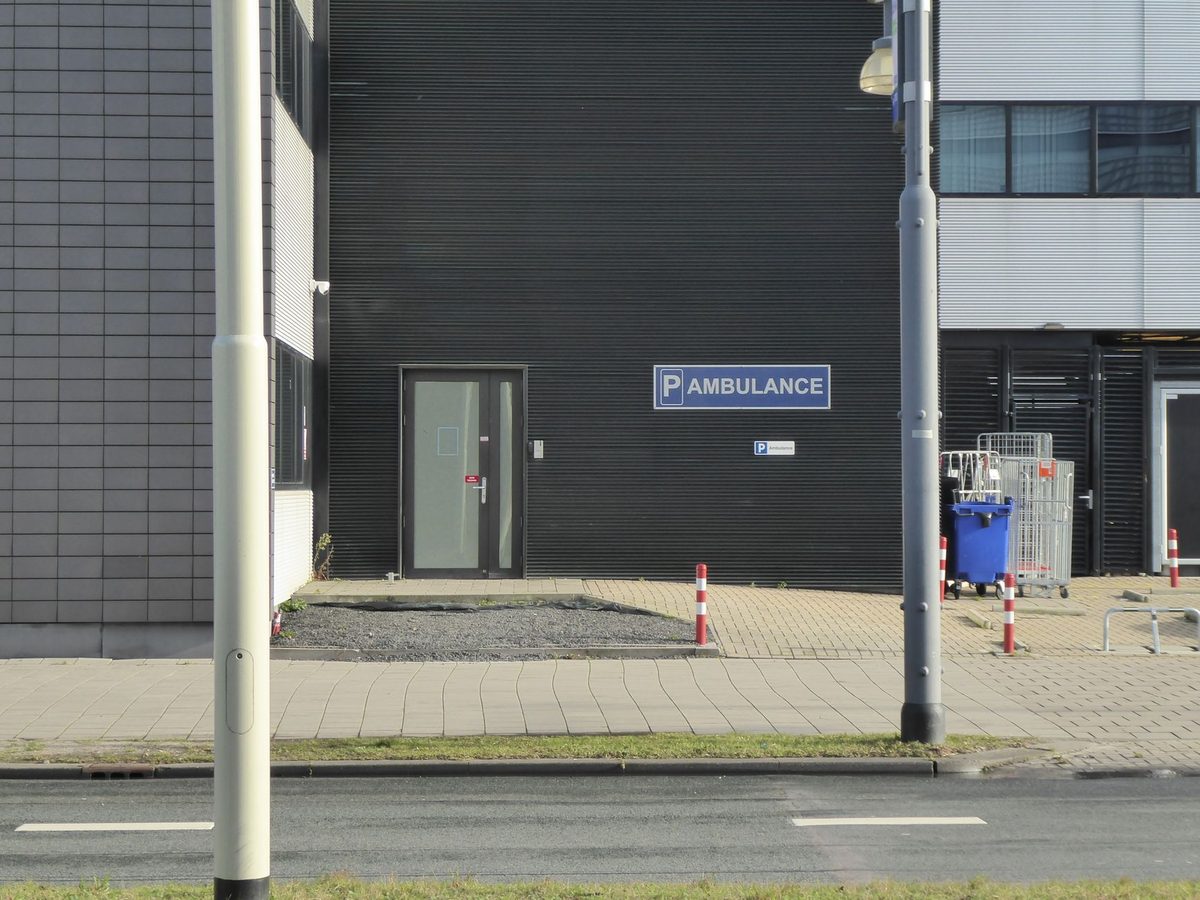 A hospital emergency entrance, a reminder that Geneva travel insurance is essential