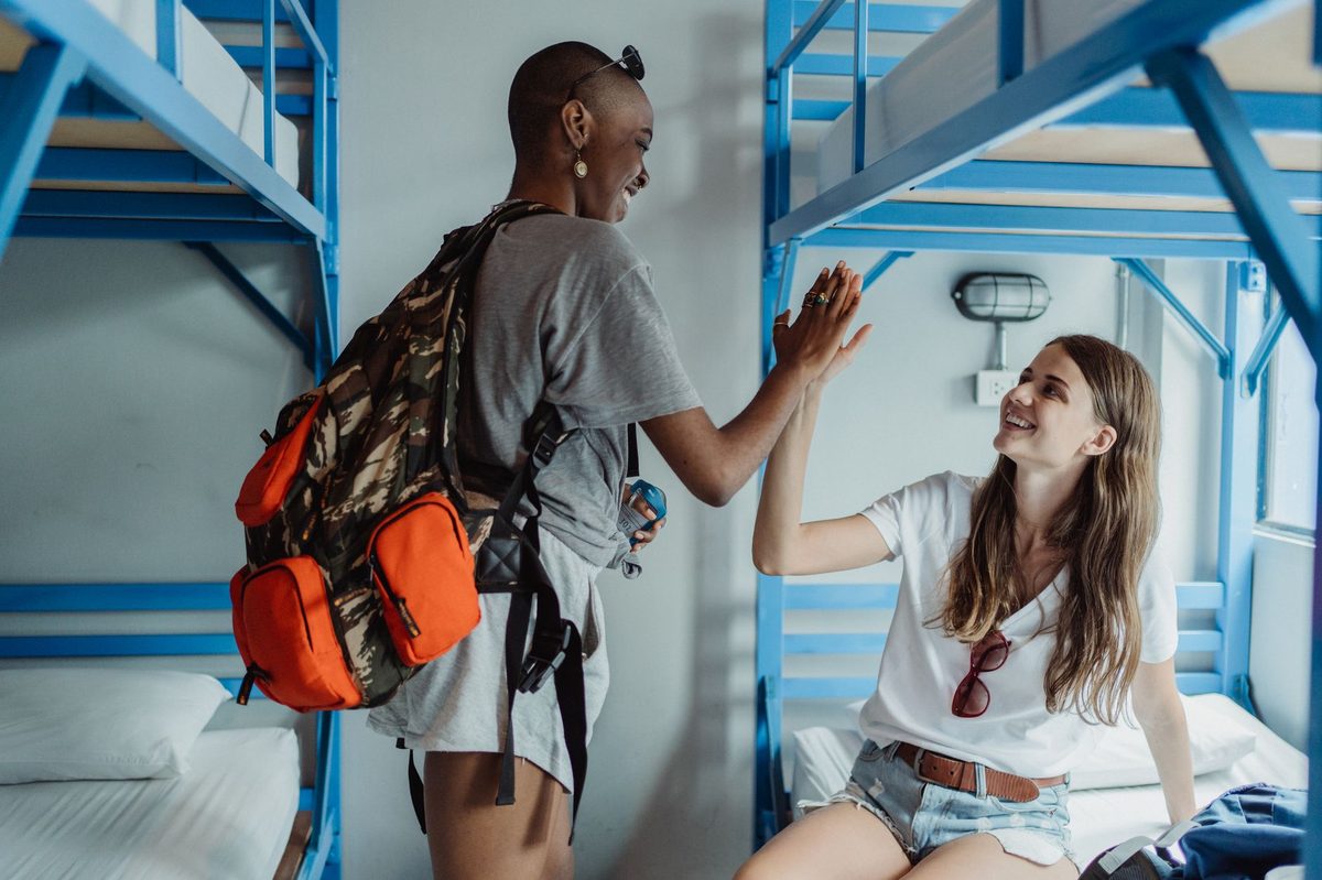 Hostel dorm with bunk beds, the cheapest budget accommodation option in Geneva
