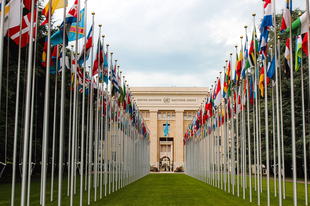 Flags outside the Palais des Nations in Geneva, the heart of the city's role as a humanitarian capital
