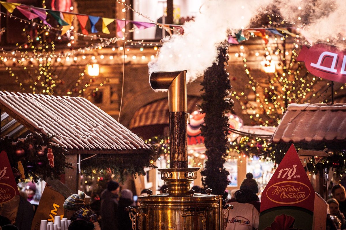Food and mulled wine stalls at the Noel au Quai Christmas market in Geneva