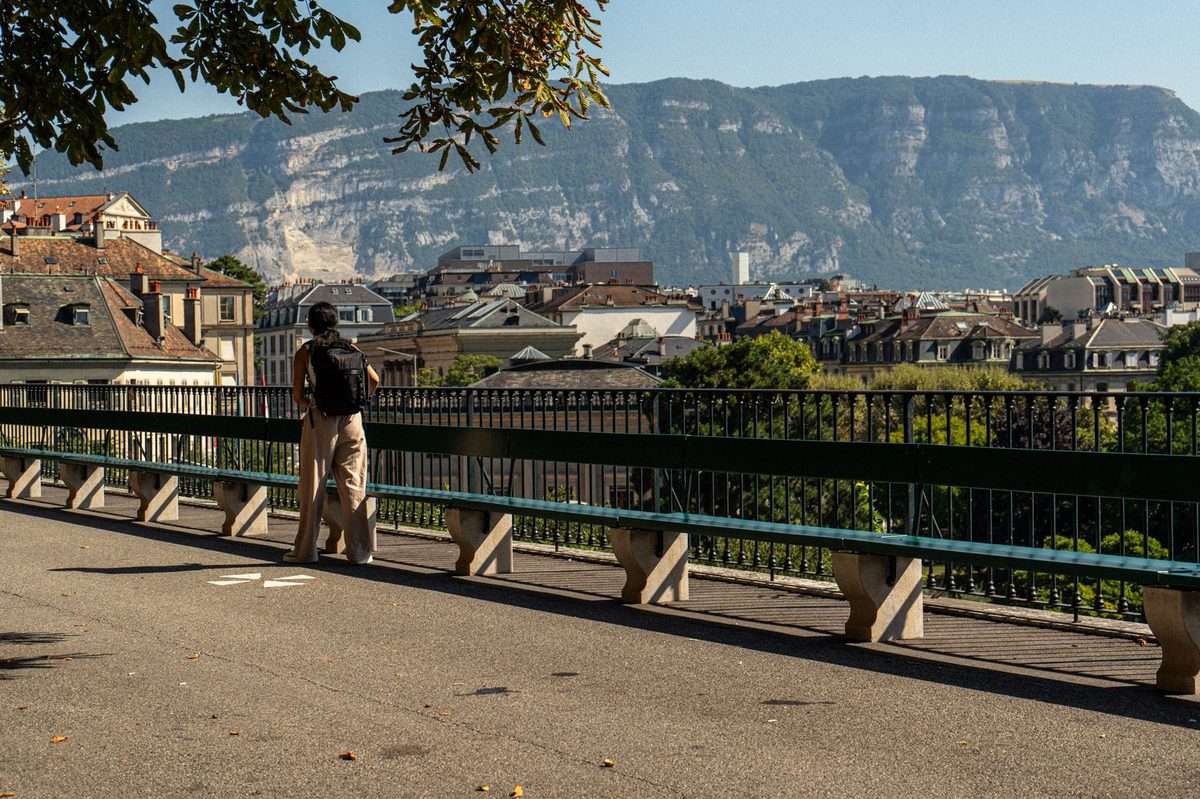 A young backpacker in Geneva, the kind of student traveler this budget guide is written for