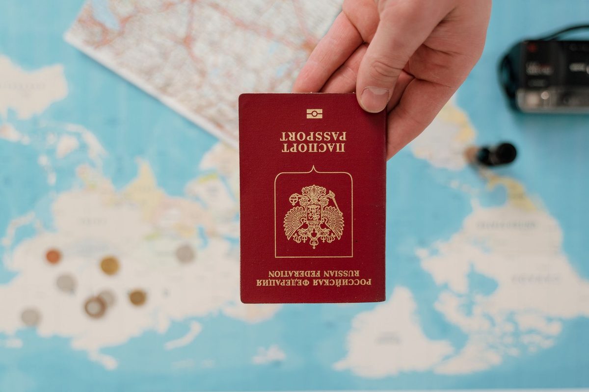 Travel insurance documents and a passport, the paperwork to sort before a Geneva trip