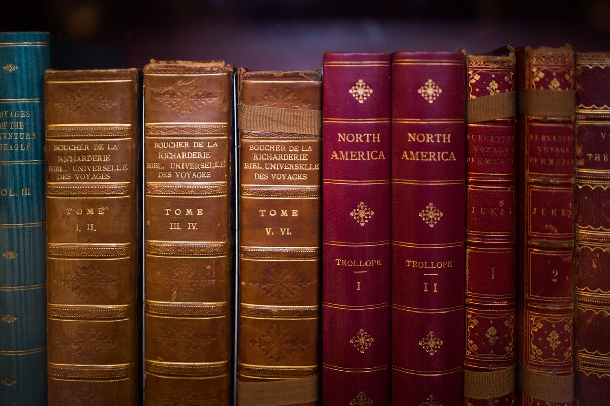 A historic university library, evoking the University of Geneva that produced Piaget and many scientists