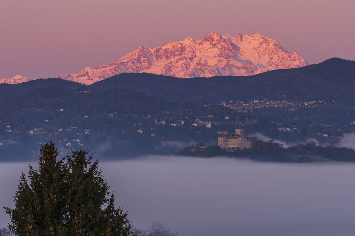 Looking down on a sea of cloud over Geneva with the Alps lit by sun