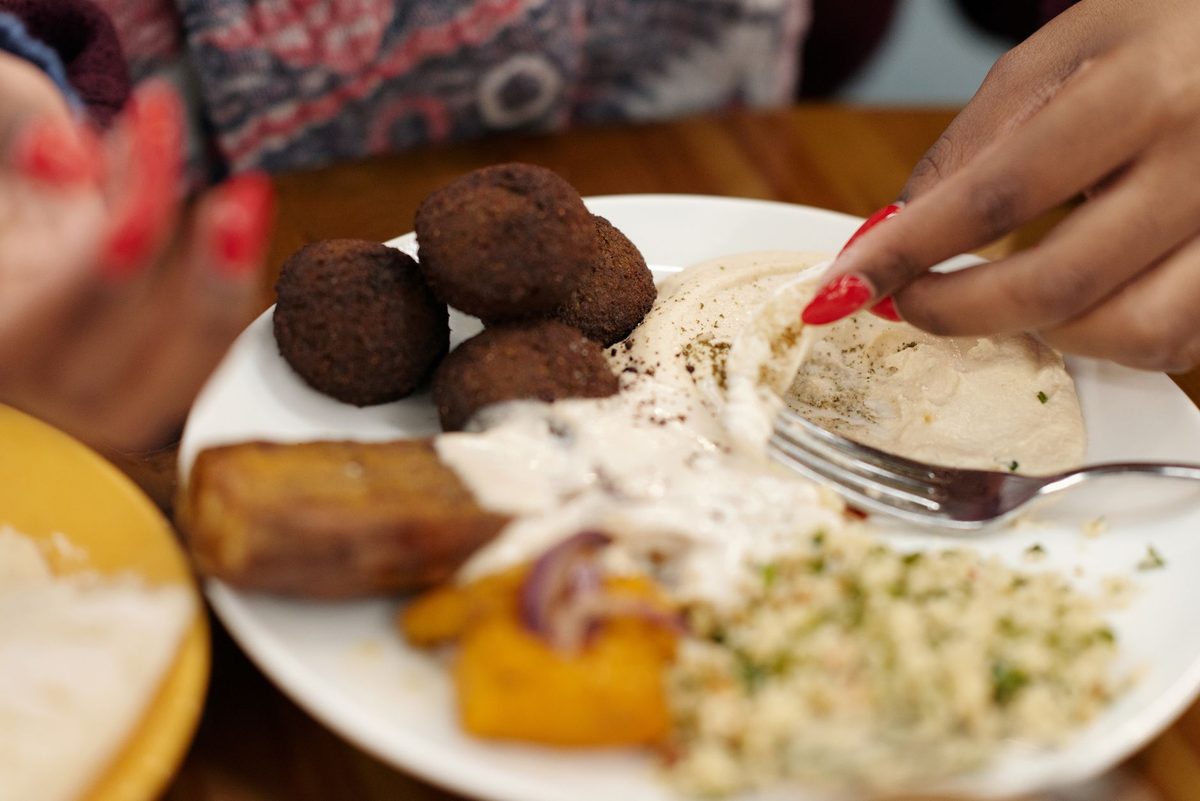 A plate of falafel and mezze, the kind of Lebanese food Paquis is known for in Geneva