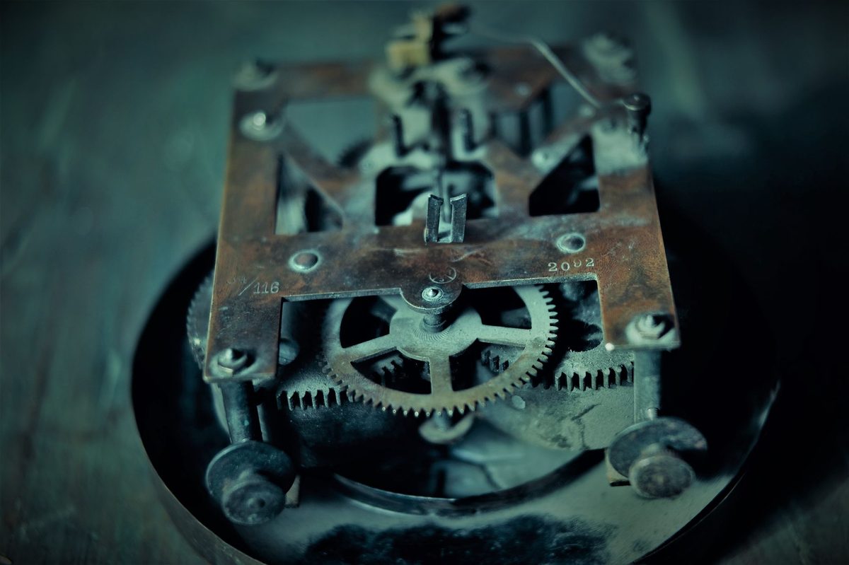 Brass clockwork gears similar to the automata mechanisms on display at the museum in Geneva