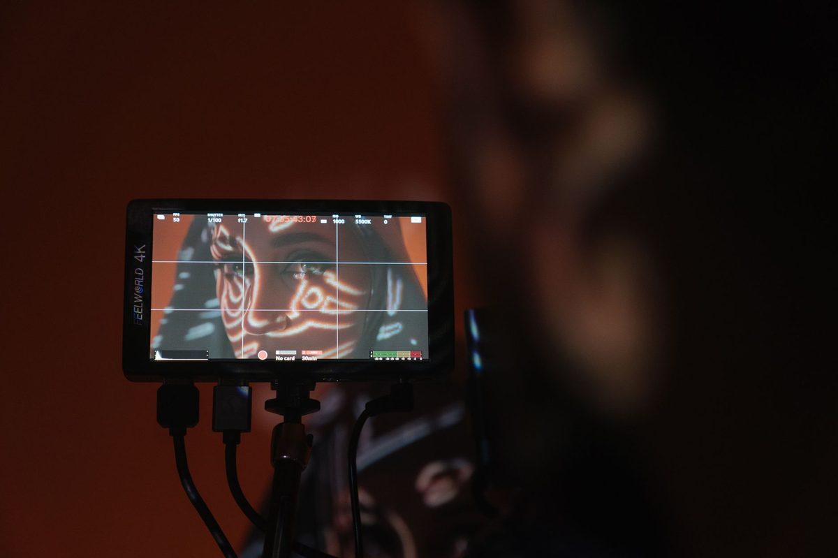 A darkened video-projection installation echoing the Chamber of Witnesses
