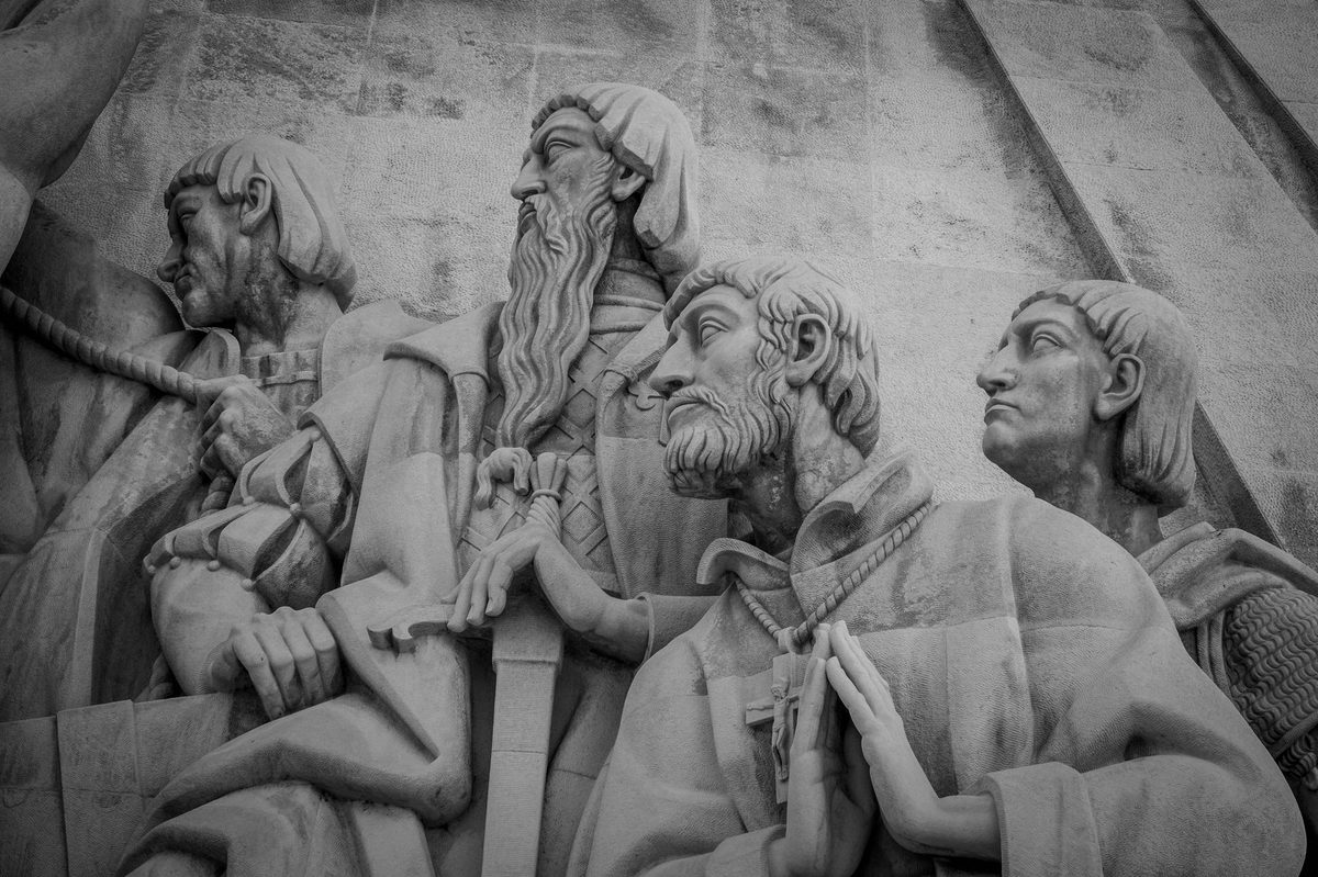Close view of a reformer statue on Geneva's Reformation Wall