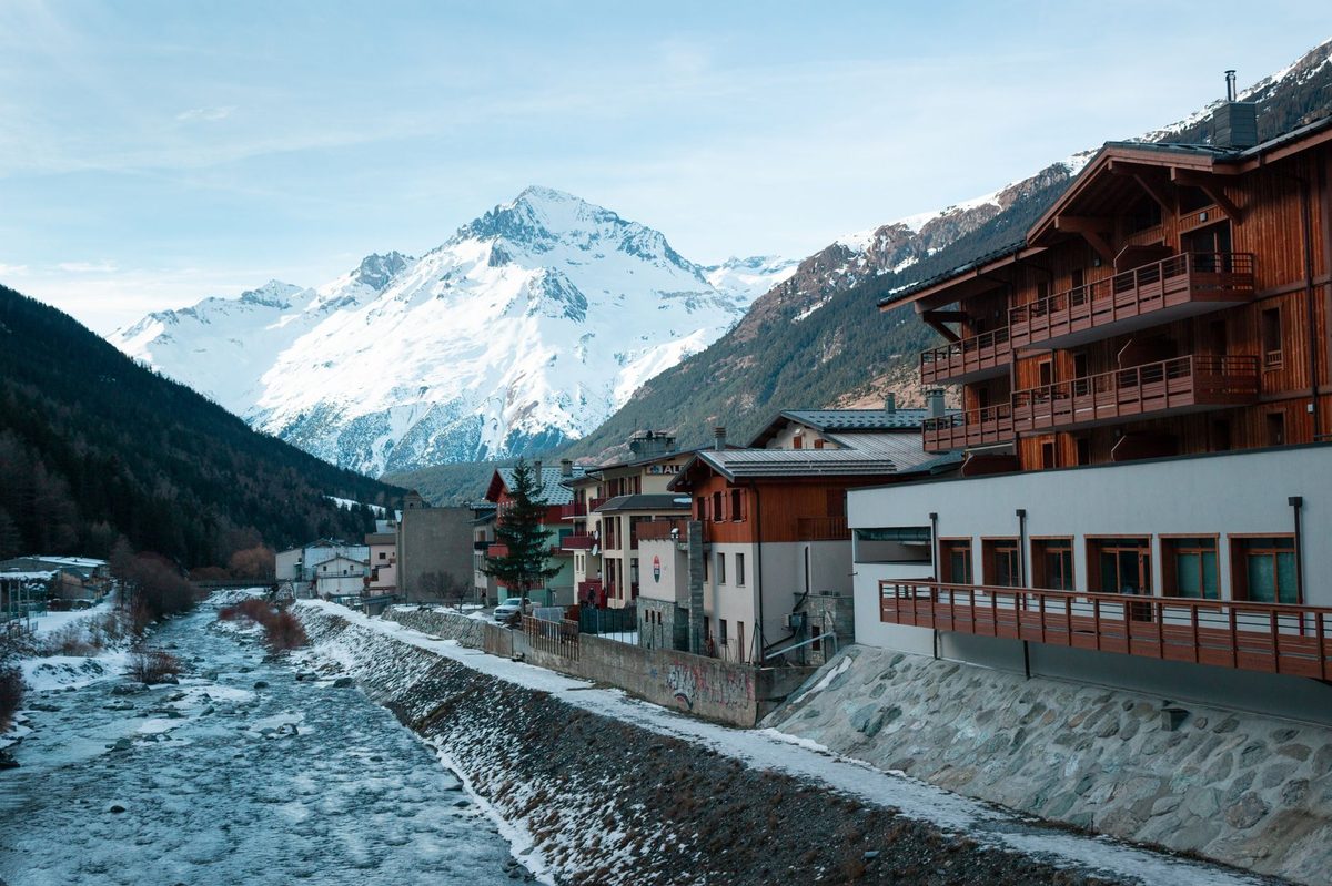 Alpine ski village with snow-covered chalets near Geneva in the Swiss Alps