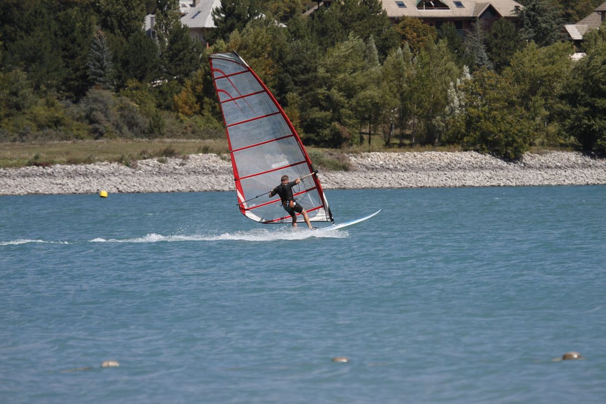 Windsurfer powered by the Bise wind on Lake Geneva near Geneva