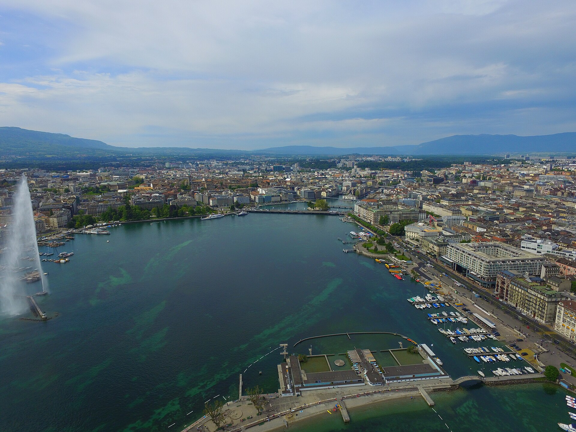Aerial view of Geneva harbour with the Bains des Paquis jetty and the Jet d'Eau
