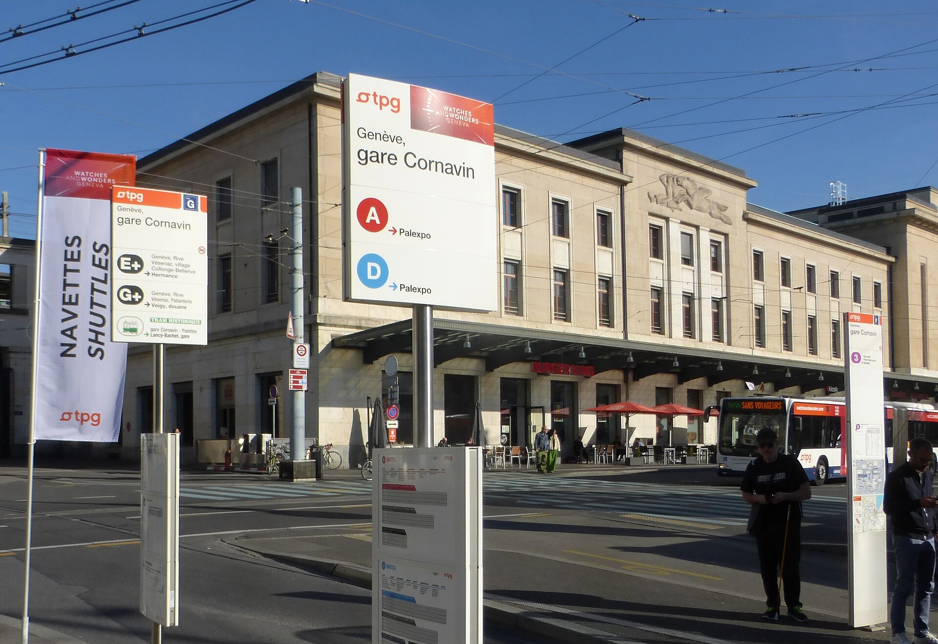tpg signs and banners outside Geneva's Cornavin station for the Watches and Wonders shuttle buses to Palexpo