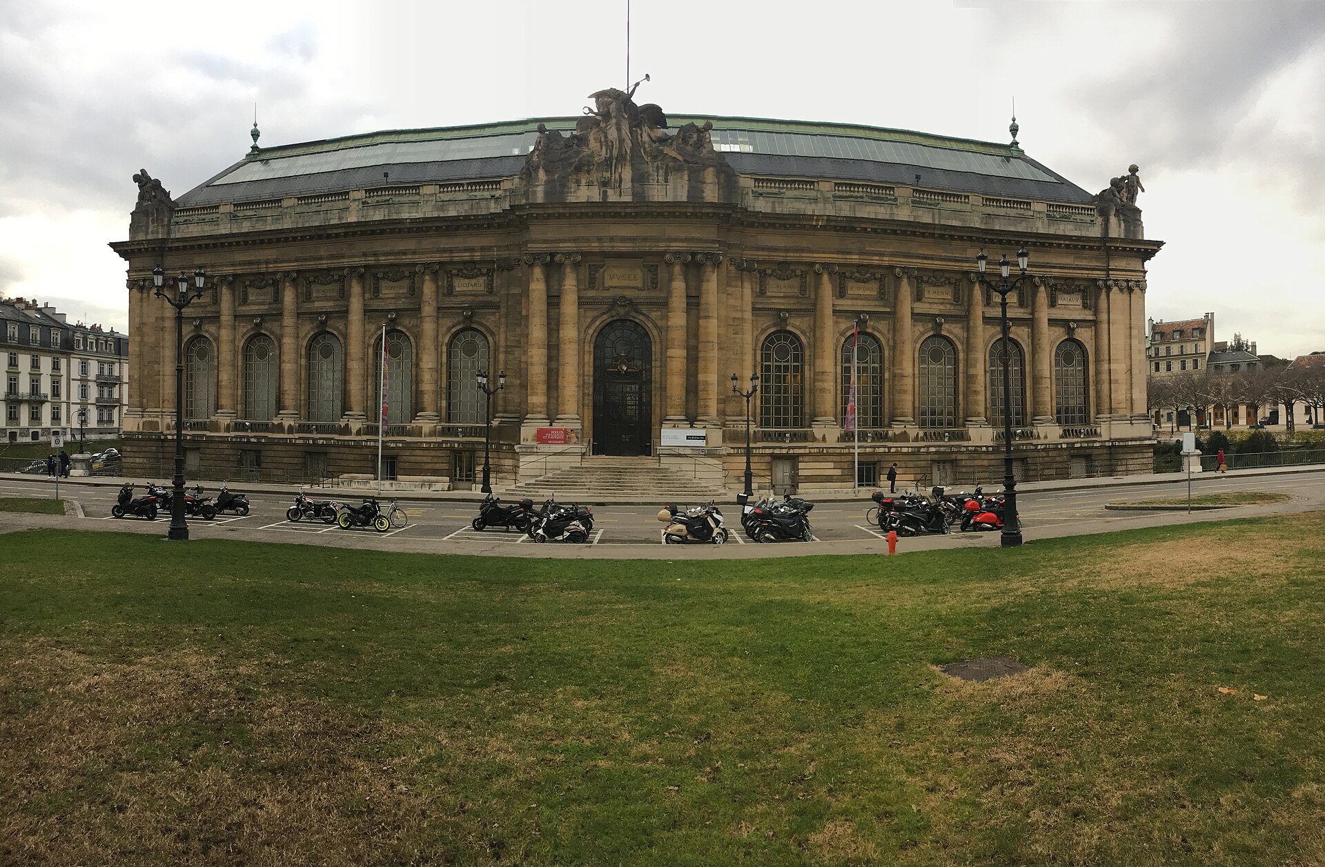 The façade of the Musée d'Art et d'Histoire in Geneva under a grey December sky