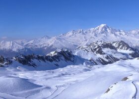 Mont Blanc and the snow-covered Tarentaise peaks seen from the ski pistes above Les Arcs