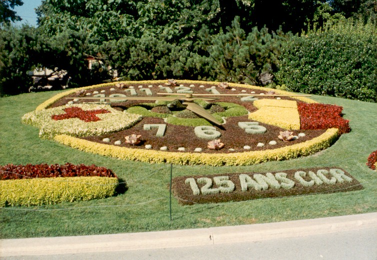 The Flower Clock in Geneva planted with a red cross design and the words 125 ans CICR, marking the Red Cross anniversary in 1988
